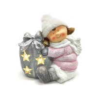 Winterkind M&auml;dchen mit Geschenk mit LED